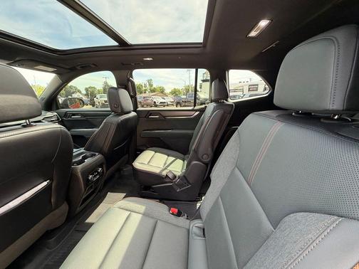 Volcanic Red Tintcoat 2025 GMC Acadia AWD AT4