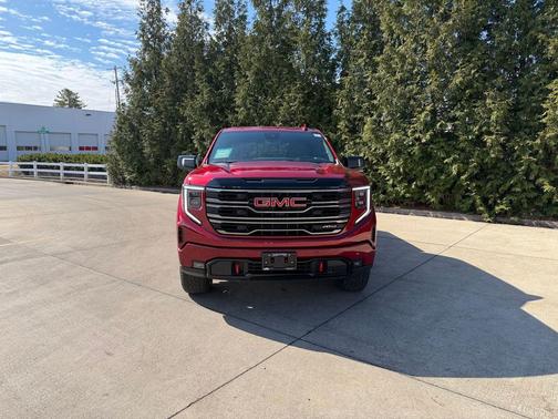 Volcanic Red Tintcoat 2026 GMC Sierra 1500 AT4