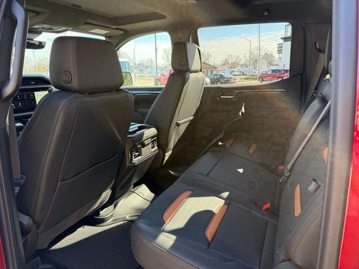 Volcanic Red Tintcoat 2026 GMC Sierra 1500 AT4