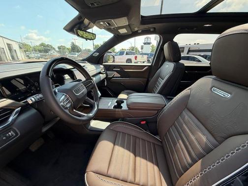 Volcanic Red Tintcoat 2026 GMC Acadia Denali