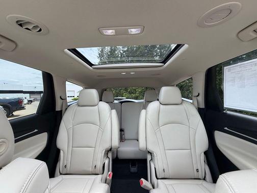 Cherry Red Tintcoat 2023 Buick Enclave Essence AWD