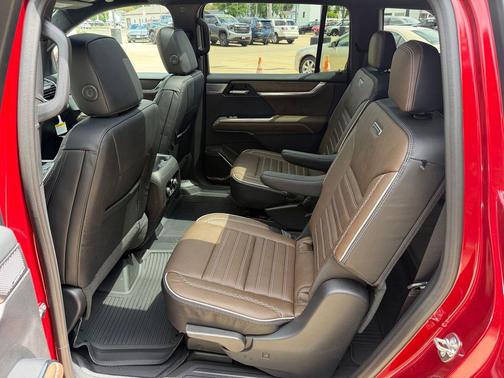 Volcanic Red Tintcoat 2026 GMC Acadia Denali