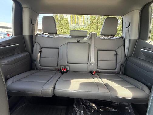 Volcanic Red Tintcoat 2026 GMC Sierra 1500 SLT