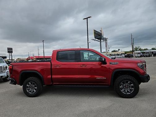 Volcanic Red 2026 GMC Sierra 1500 AT4X