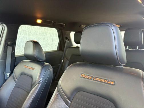 Obsidian Green Pearl/Super Black 2024 Nissan Pathfinder Rock Creek 4WD
