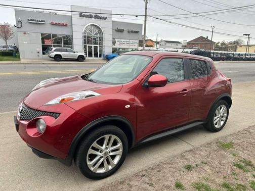 Red 2013 Nissan Juke SV AWD 4dr Crossover