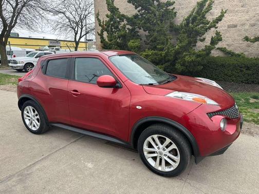 Red 2013 Nissan Juke SV AWD 4dr Crossover