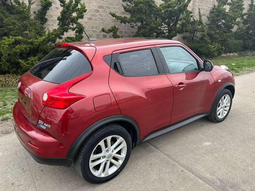 Red 2013 Nissan Juke SV AWD 4dr Crossover