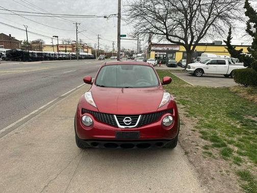 Red 2013 Nissan Juke SV AWD 4dr Crossover