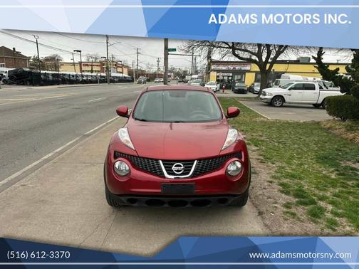 Red 2013 Nissan Juke SV AWD 4dr Crossover