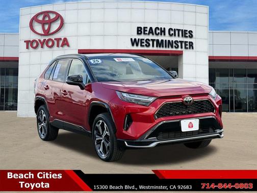 Supersonic Red/Midnight Black Metallic 2025 Toyota RAV4 Hybrid SE