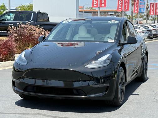 Solid Black 2024 Tesla Model Y Long Range Single Motor Rear-Wheel Drive