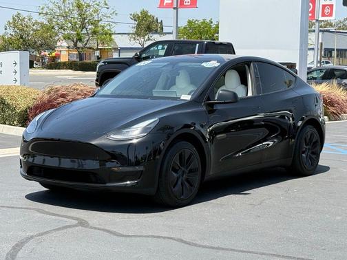 Solid Black 2024 Tesla Model Y Long Range Single Motor Rear-Wheel Drive