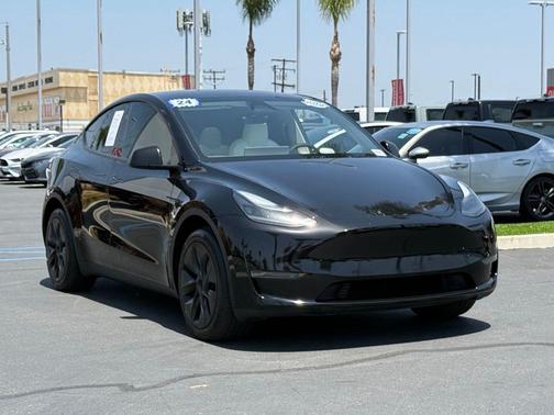 Solid Black 2024 Tesla Model Y Long Range Single Motor Rear-Wheel Drive