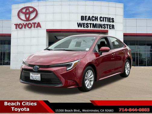 Ruby Flare Pearl 2025 Toyota Corolla Hybrid LE