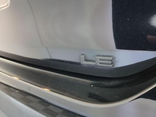 Midnight Black Metallic 2023 Toyota Highlander LE