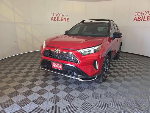 Supersonic Red/Midnight Black Metallic 2025 Toyota RAV4 Hybrid SE