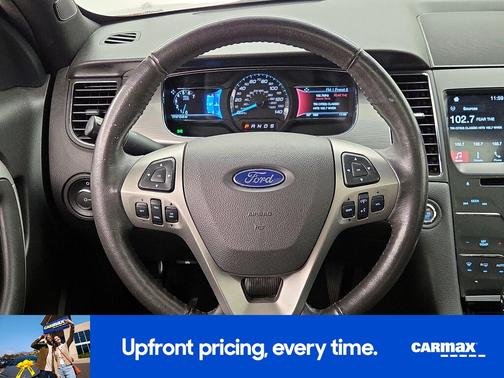 Red 2016 Ford Taurus SEL