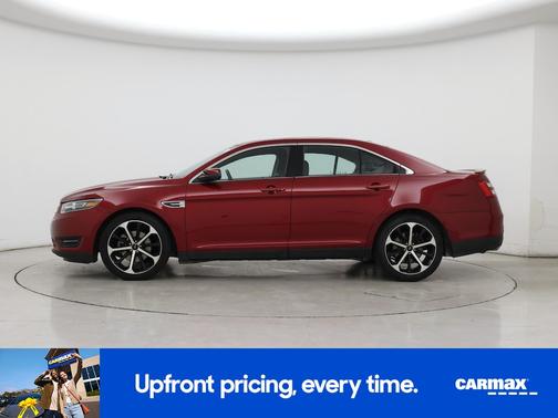 Red 2016 Ford Taurus SEL