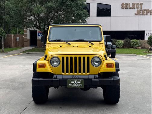 Solar Yellow Clearcoat 2002 Jeep Wrangler Sport