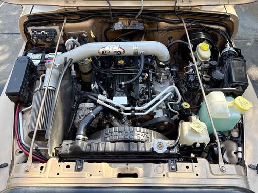 Desert Sand Pearlcoat 2000 Jeep Wrangler Sport