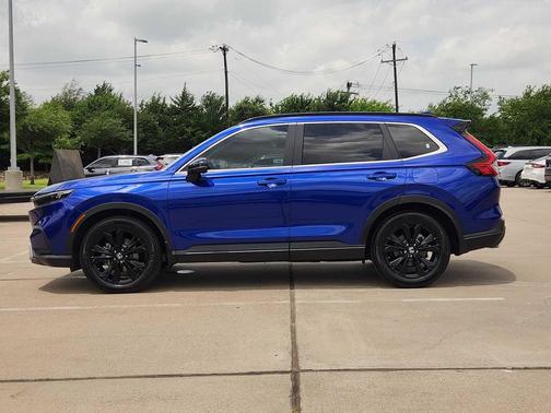 Still Night Pearl 2024 Honda CR-V Hybrid Sport Touring AWD