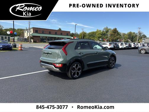 Cityscape Green 2024 Kia Niro Touring