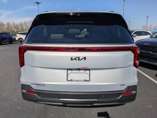 Ivory 2026 Kia Carnival Hybrid SX Prestige