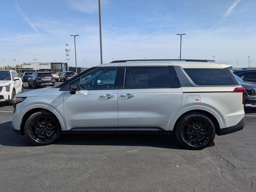 Ivory 2026 Kia Carnival Hybrid SX Prestige