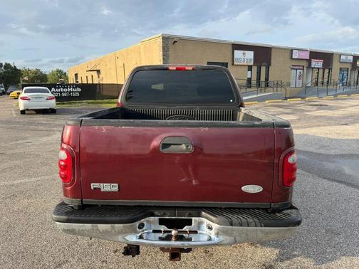 Red 2003 Ford F-150 XLT SuperCrew