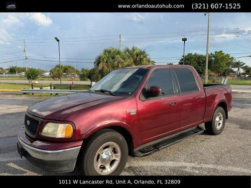 Red 2003 Ford F-150 XLT SuperCrew
