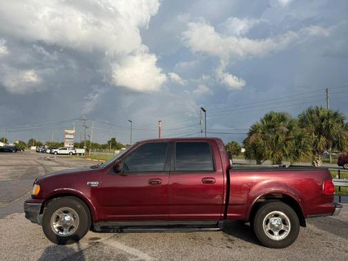 Red 2003 Ford F-150 XLT SuperCrew