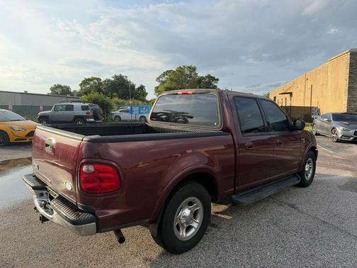 Red 2003 Ford F-150 XLT SuperCrew