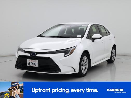 White 2023 Toyota Corolla Hybrid LE
