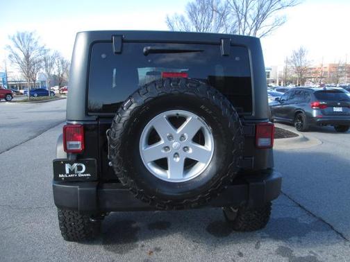 Photo 3 of 26 of 2015 Jeep Wrangler Unlimited Sport