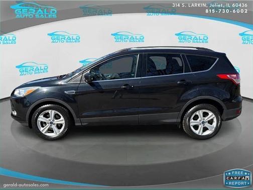 Ruby Red Metallic Tinted Clearcoat 2015 Ford Escape SE