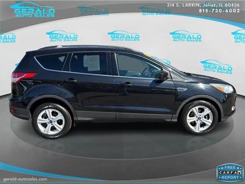 Ruby Red Metallic Tinted Clearcoat 2015 Ford Escape SE