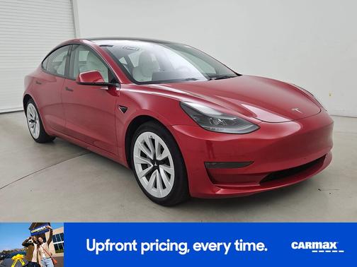 Red 2023 Tesla Model 3