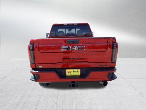 Volcanic Red Tintcoat 2026 GMC Sierra 3500 AT4