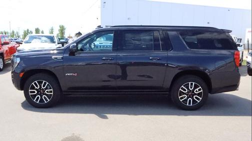 Titanium Rush Metallic 2023 GMC Yukon XL 4WD AT4