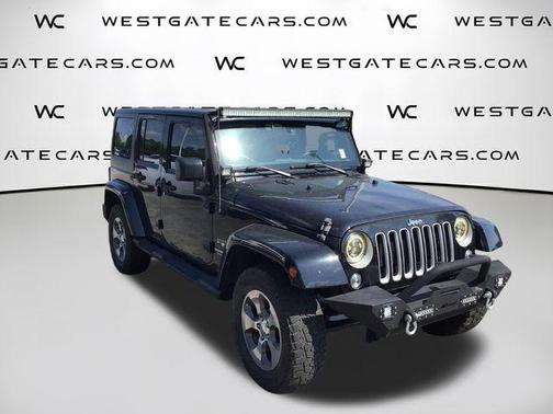 Black Clearcoat 2016 Jeep Wrangler Unlimited Sahara