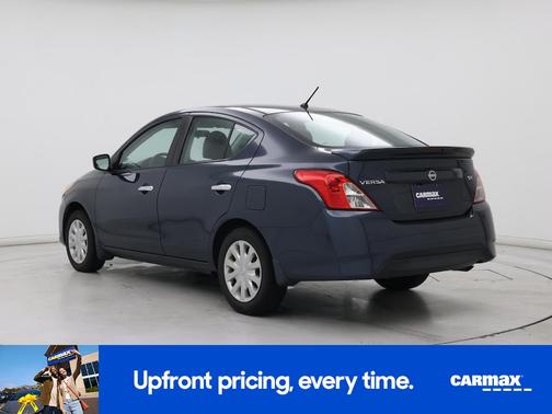 Green 2017 Nissan Versa SV