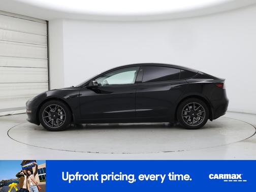 Black 2023 Tesla Model 3