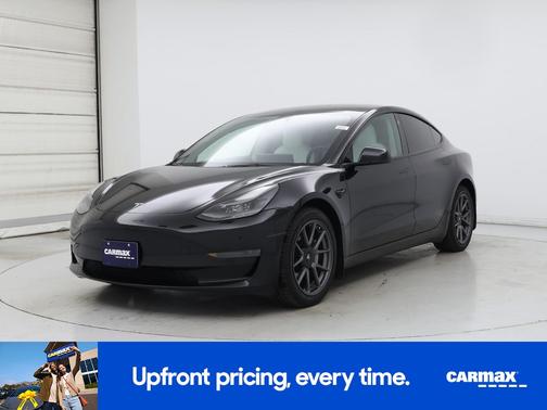 Black 2023 Tesla Model 3