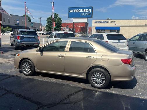 Desert Sand Mica 2010 Toyota Corolla LE