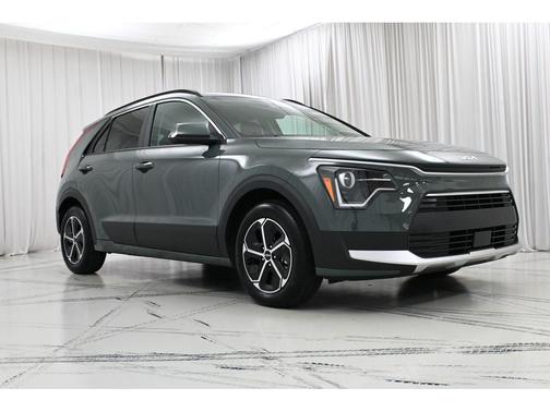 Cityscape Green 2025 Kia Niro Plug-In Hybrid EX