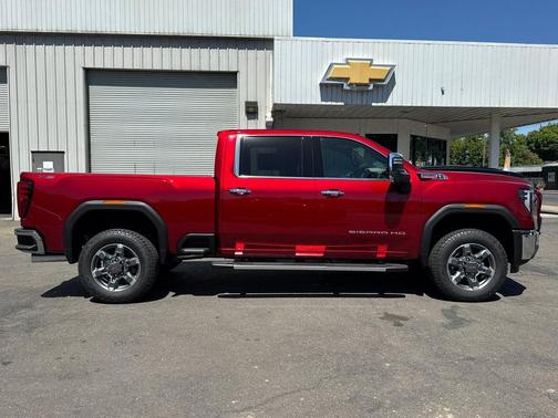 Volcanic Red Tintcoat 2026 GMC Sierra 2500 SLT