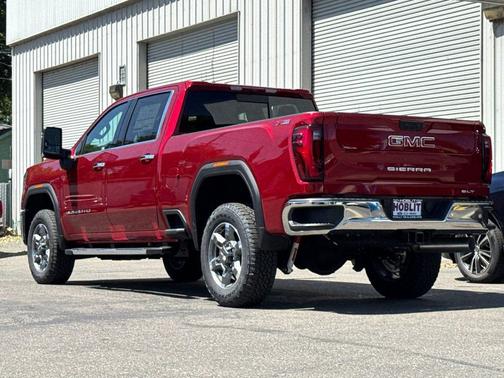 Volcanic Red Tintcoat 2026 GMC Sierra 2500 SLT