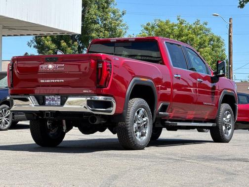 Volcanic Red Tintcoat 2026 GMC Sierra 2500 SLT
