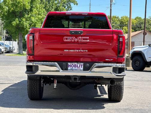Volcanic Red Tintcoat 2026 GMC Sierra 2500 SLT
